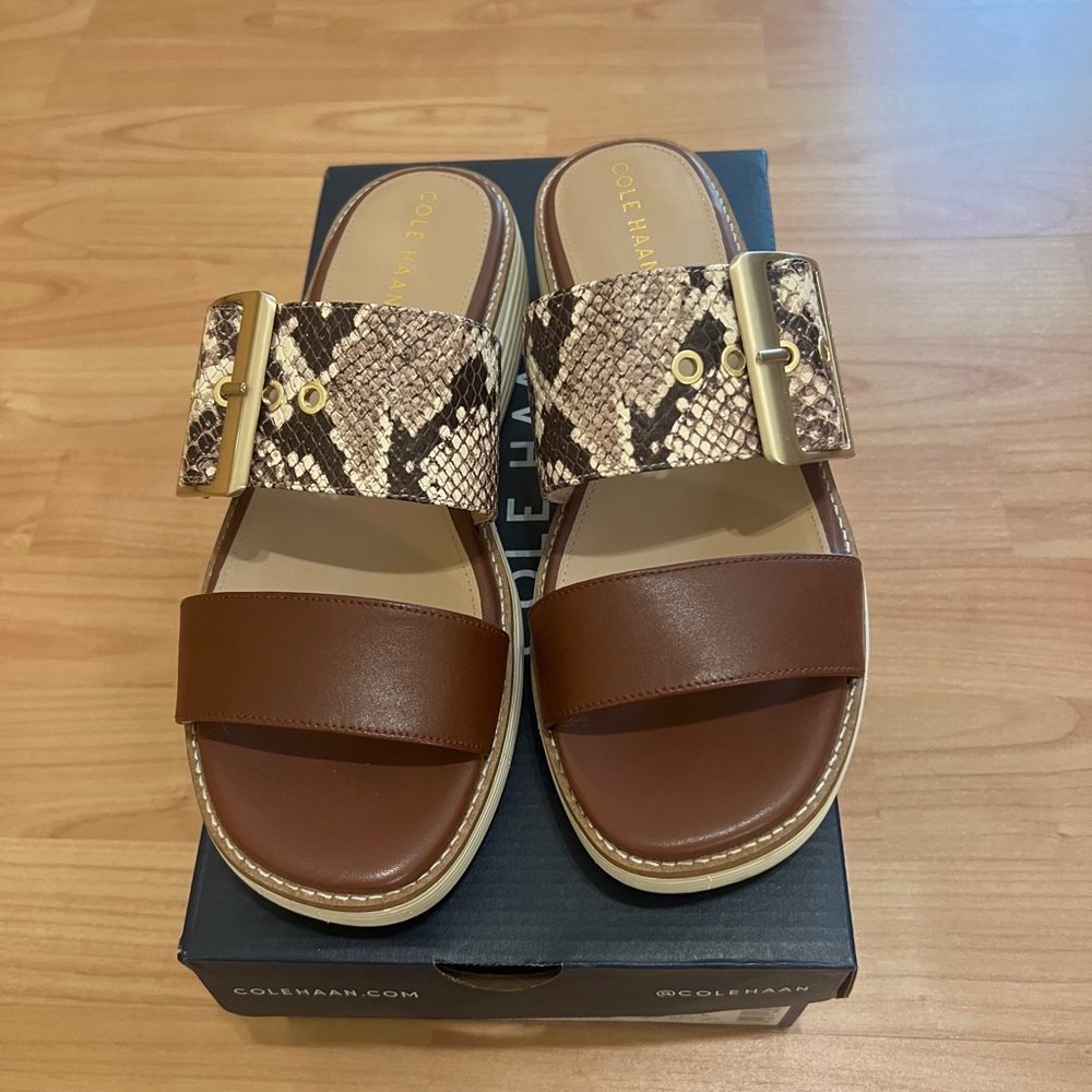 Cole Haan-Brown and Snake Print Sandals runs big Fits a size 8 US.